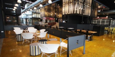 Capri on Via Roma Shines Bright with Transitions Stained Concrete Floors Capri on Via Roma goes yellow with Transitions Stained Concrete Floors